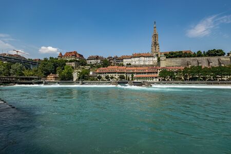 Bern, Switzerland - July 26, 2019: Panoramic view at sunny summer day. Aare river near Schwellenmatteli sport complex city Park.の写真素材