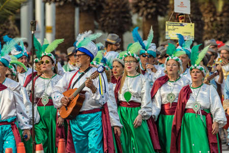 SANTA CRUZ DE TENERIFE, SPAIN - FEBRUARY 25, 2020: Coso parade - along the Avenida de Anaga, official end of Carnival. Again march carnival groups, floats, decorated cars and the Carnival Queens.のeditorial素材