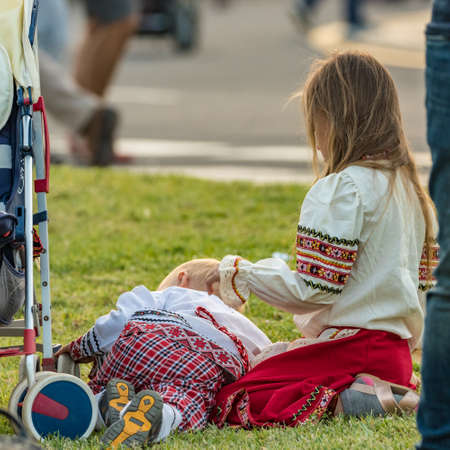 SANTA CRUZ DE TENERIFE, SPAIN - FEBRUARY 25, 2020: Around the Coso parade - along the Avenida de Anaga, official end of Carnival. Amazing warm evening, joyful people in carnival costumes have fun.のeditorial素材