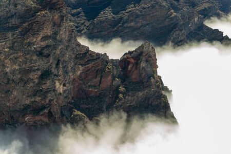 Above the clouds. Aerial view of the National Park Caldera de Taburiente, volcanic crater seen from...