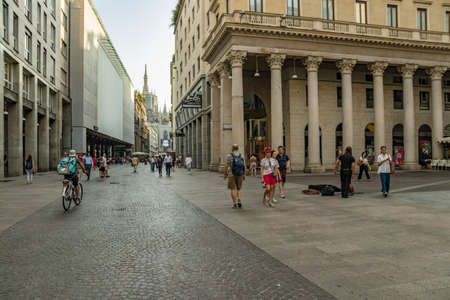 MILAN, ITALY - AUGUST 01, 2019: Tourists and locals walk in the center of Milano. Shops, boutiques, cafes and restaurants.のeditorial素材