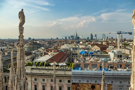 Milan, Italy - Aug 1, 2019: Aerial View from the roof of Milan Cathedral - Duomo di Milano,...