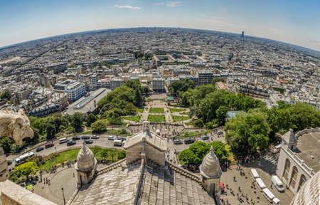 PARIS, FRANCE - JUNE 23, 2016: Super wide panorama. Aerial view from Basilica of the Sacred Heart of Jesus stands at the summit of the butte  Montmartre - highest point in the Paris.のeditorial素材
