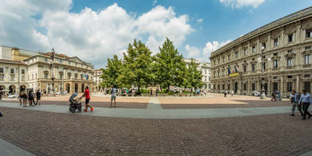 MILAN, ITALY - AUGUST 01, 2019: Tourists and locals walk in the center of Milano. Shops, boutiques,...