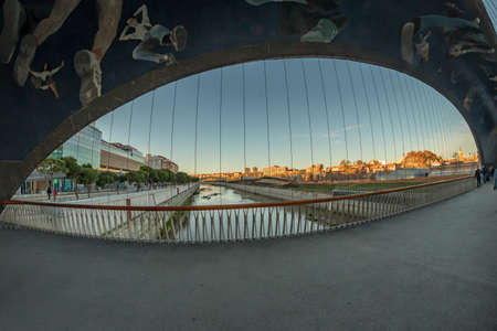 MADRID, SPAIN - DECEMBER 13, 2018: The Matadero bridge over Manzanares River downtown Madrid, Spain.のeditorial素材