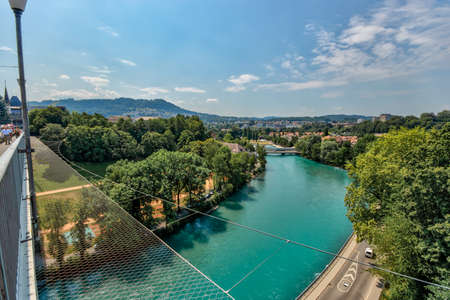 Bern, Switzerland - July 26, 2019: Panoramic view from one of the bridges. . Aare river at sunny...