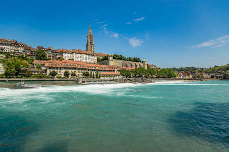 Bern, Switzerland - July 26, 2019: Panoramic view of the Aare river at sunny summer day.のeditorial素材