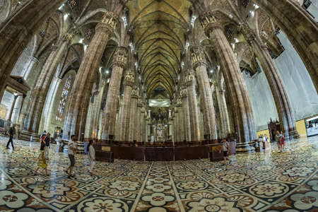 MILAN, ITALY - AUG 1, 2019: Interior of the famous Cathedral Duomo di Milano on piazza in Milan, Italy. Fish eye lens shot.のeditorial素材