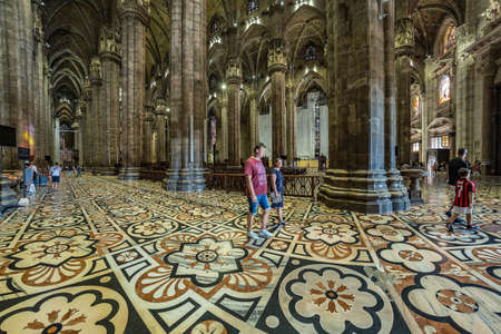 MILAN, ITALY - AUG 1, 2019: Interior of the famous Cathedral Duomo di Milano on piazza in Milan, Italy. Super wide angle lens shot.のeditorial素材