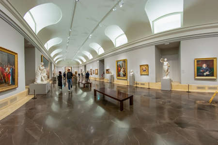 MADRID, SPAIN - DECEMBER 13, 2018: Visitors inside the Prado Museum a major cultural landmark in Madrid.のeditorial素材