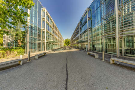 Bern, Switzerland - July 30, 2019: A modern metal concrete and glass mounted building in the Swiss...