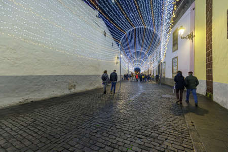 La Laguna, Tenerife, Spain - November 28, 2020: Night streets decorated for christmas and new year during a pandemic. Walk through the pre Christmas La Laguna, the old capital of Tenerife.のeditorial素材