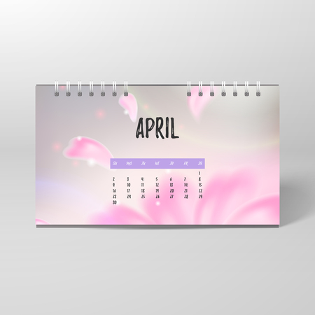 Vector desk spiral calendar. Blurred lights on gray background. Flower and petals that are flying. April.の写真素材