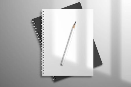 White and black spiral notebooks and pencil is on top. Mockup for design with light from a windowのイラスト素材