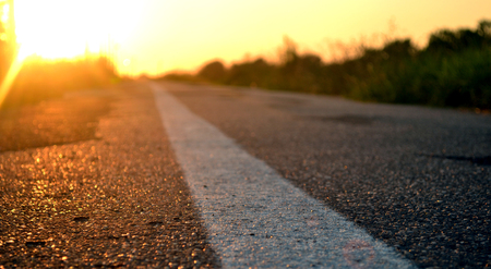 Road ahead and the sunsetの写真素材