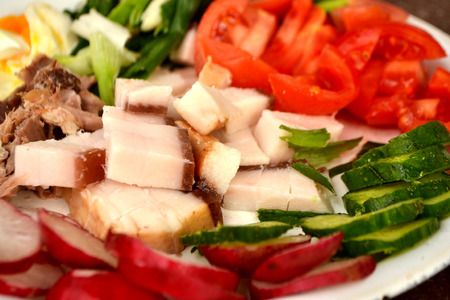 moked fat bacon with egg and delicious fresh vegetablesの写真素材