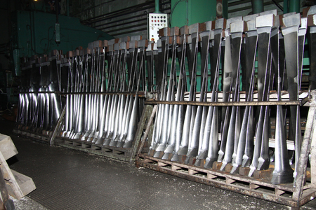 Industrial production of turbines for heavy industry. Huge steel turbine components. Industrial. Manufacture of water turbines. The huge machine turbine production. Large parts of the plant.の写真素材