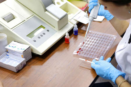 Blood donor. Preparation and donation of blood for the needs of patients. A woman takes blood for...