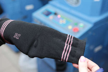 Industrial enterprise for the production of socks. Large production of socks. Lots of modern...