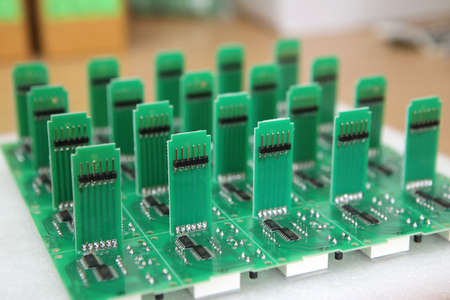 Lots of radios. Loose electronic parts on the table. Digital indicator, LEDs, capacitor and...