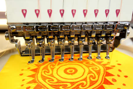 High technology automatic sewing machine control by computer programming. Sewing machine for mass...