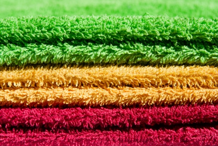 a stack multicolored bath towelsの写真素材
