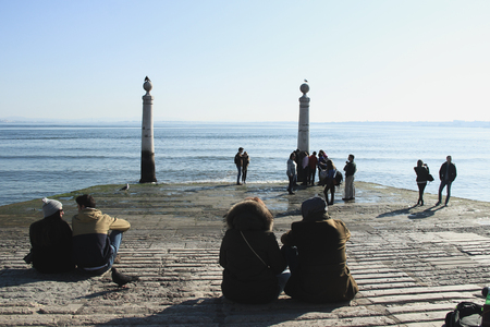 group people near from tagus river in cais das colunas near from the Commerce Square Lisbon Portugal. May 2017のeditorial素材