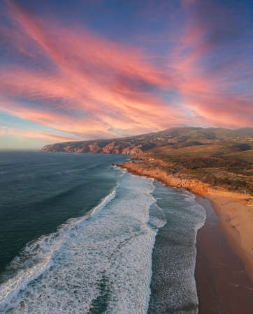 Aerial view from the beach at the sunset. Guincho beach in Cascais Portugalの写真素材