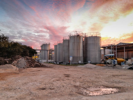Large metal silo for storing raw material. Modern industrial plant.の写真素材