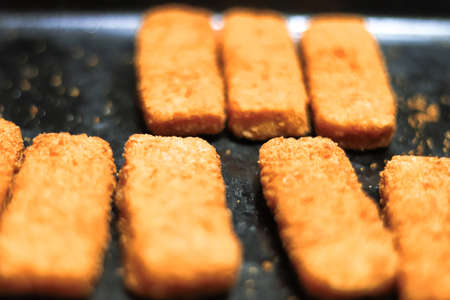 Crispy chicken nuggets in an oven