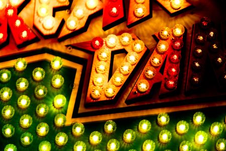 Colored Carousel Lights Sign Billboard Closeup の写真素材