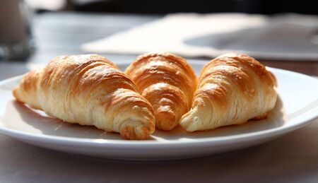 Tasty Croissants Snack On A White Plateの写真素材