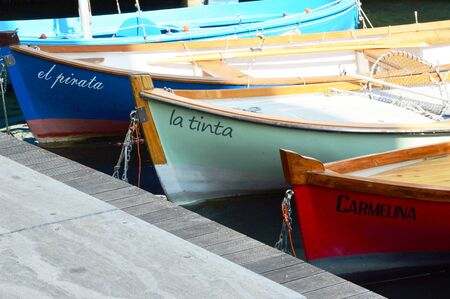 Fishing boats at the port of Torbole in Garda lake, Italyのeditorial素材