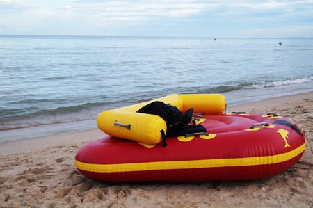 plastic boat on beach    の写真素材