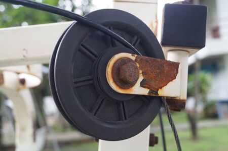 tattered pulley and wheel
