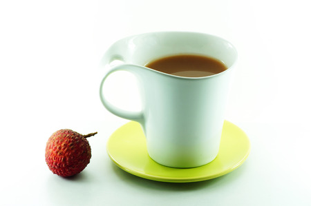 cup drink and fruit on white backgroundの写真素材