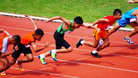 Athletic  running on trackのeditorial素材