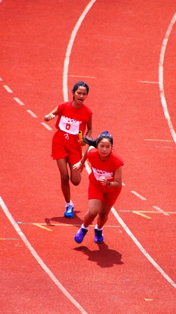 Athletic  running on trackのeditorial素材