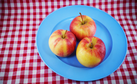 apples on a plateの写真素材