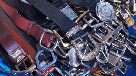 Jatujak market in Bangkok, 20 September 2014. Old buckle for selling in famous Jatujak market in Bangkok of Thailand.のeditorial素材