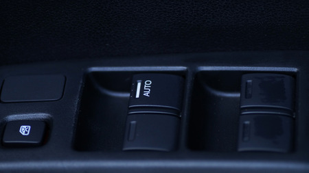 button of car\'s window