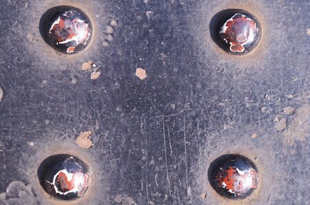 grunge background metal plate with screws