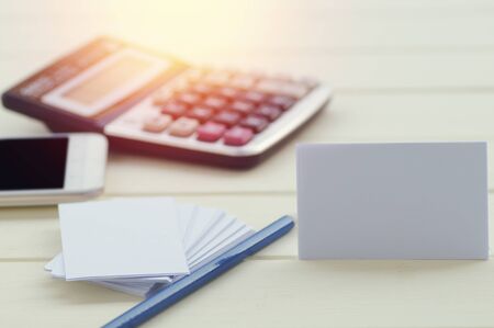 This business card presentation for promotion of Corporate identity on table ,with copy space on paper on wood tableの写真素材