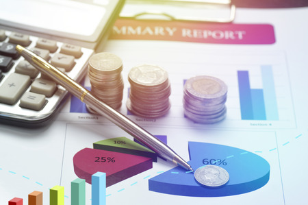 pile coin money with graph finance and banking  background.concept in grow and walk step by step for success in businessの写真素材