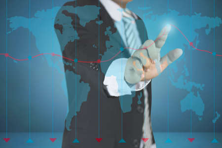 Business man pointing at growth graph and business concept on dark blue background with map....