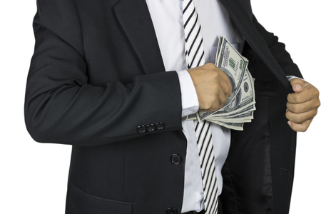 A businessman putting a one-hundred dollar banknote into the chest pocket on white background, save and bank as conceptの写真素材