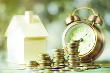 pile of money, coins  growing up, concept in business about loan, selling,finance and buying home, houseの写真素材