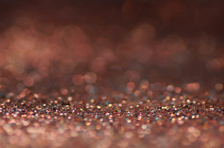defocus of glitter vintage lights background. pink,white and black for Christmas and new year background.の写真素材