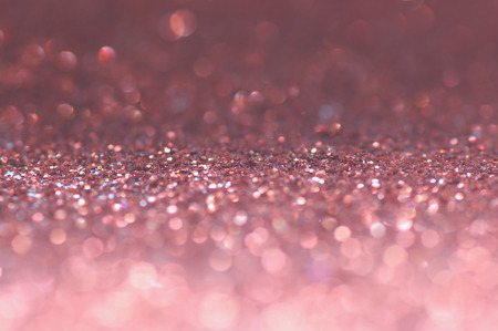 defocus of glitter vintage lights background. pink,white and black for Christmas and new year background.の写真素材