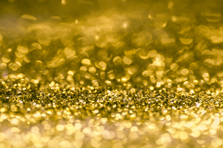Gold sparkling and bokeh backgroundの写真素材